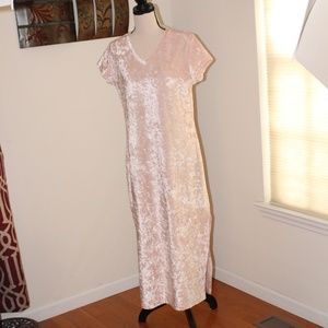 Amanda Stewart,  Leisurewear short sleeve pink dress with side slit..